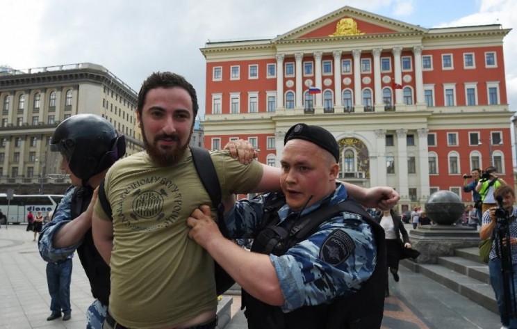 Orthodox activist Dmitry Enteo is "delusional" according to art centre. Here he is being led away by police.